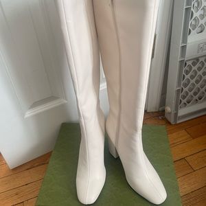 Cream knee high boots